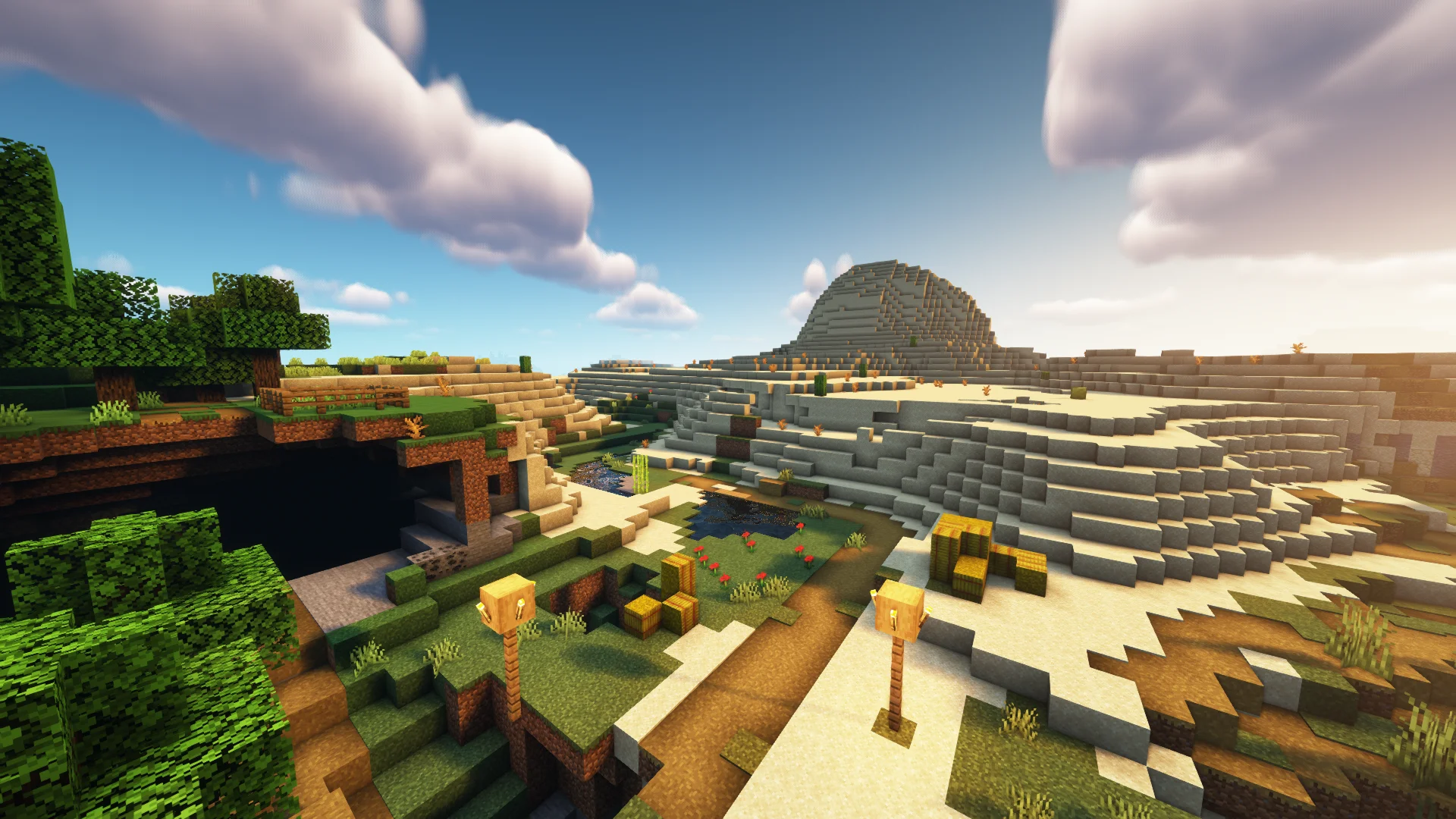 View of tall desert hill from a Minecraft village using AstraLex shaders