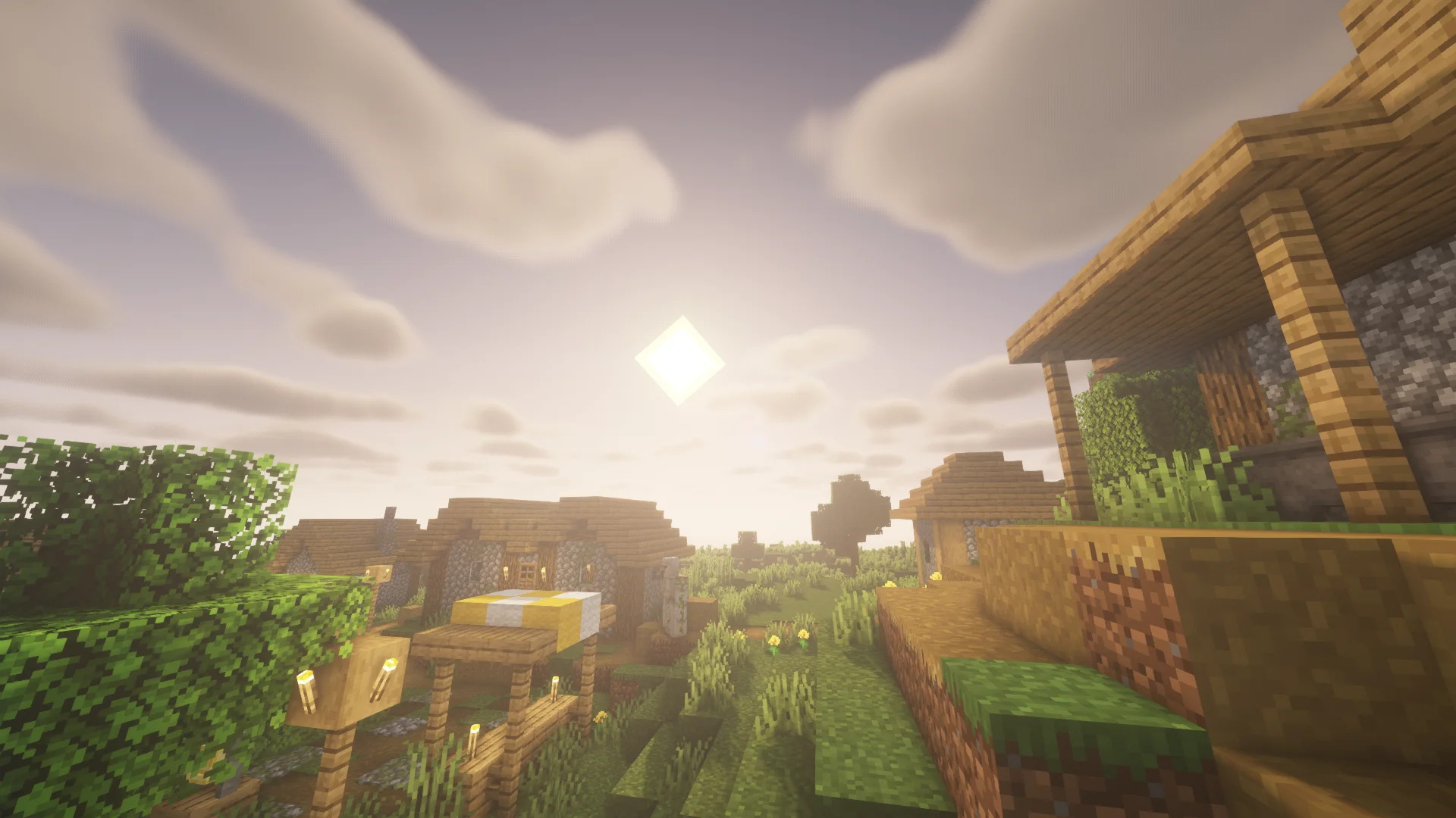 Sunset over a Minecraft village with BSL shaders